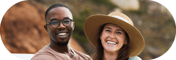 A man and woman smiling for the camera.